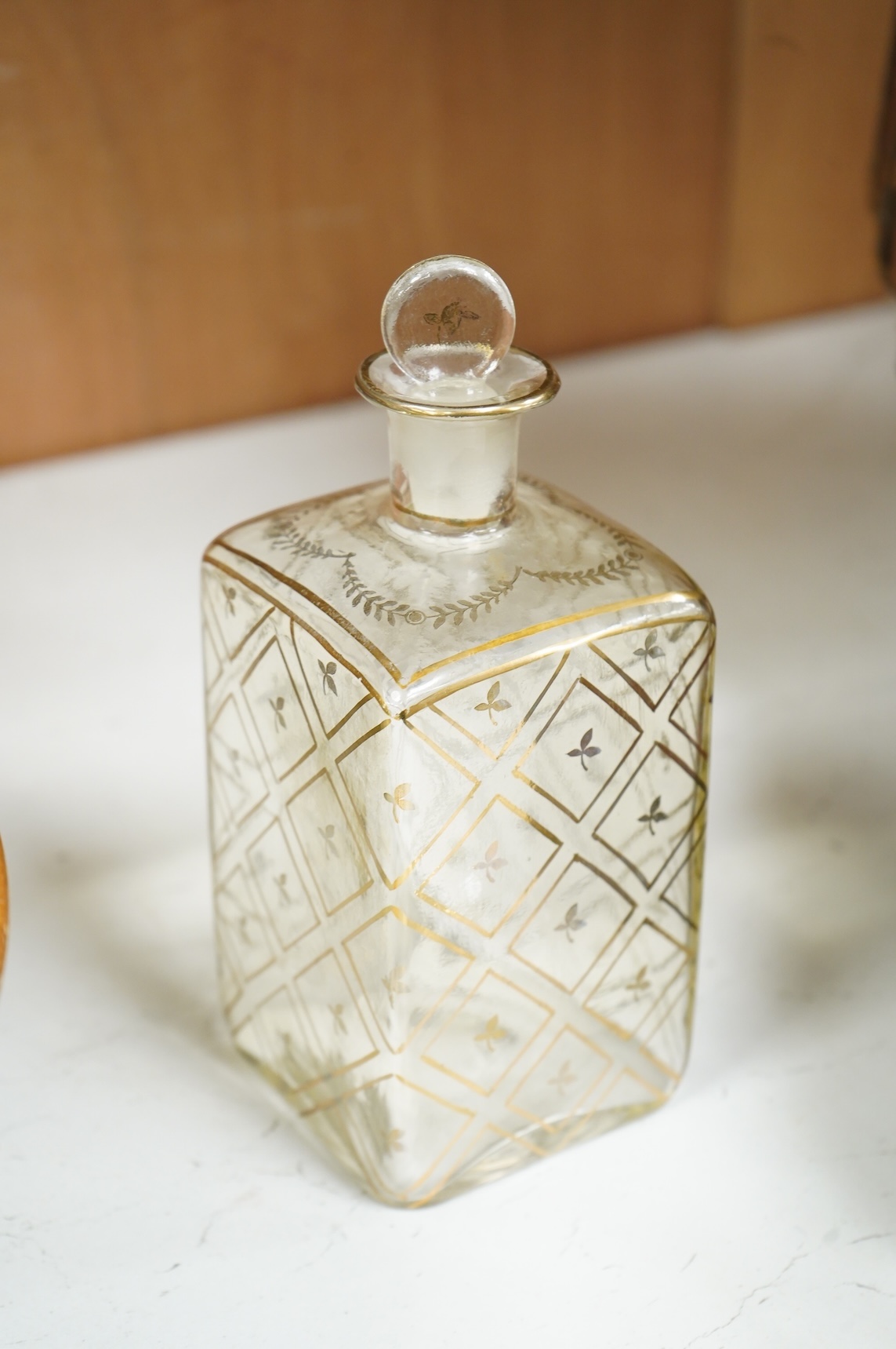 A novelty stack of books liqueur set, the contents including, decanter with stopper and five glasses, 26cm wide x 23cm high